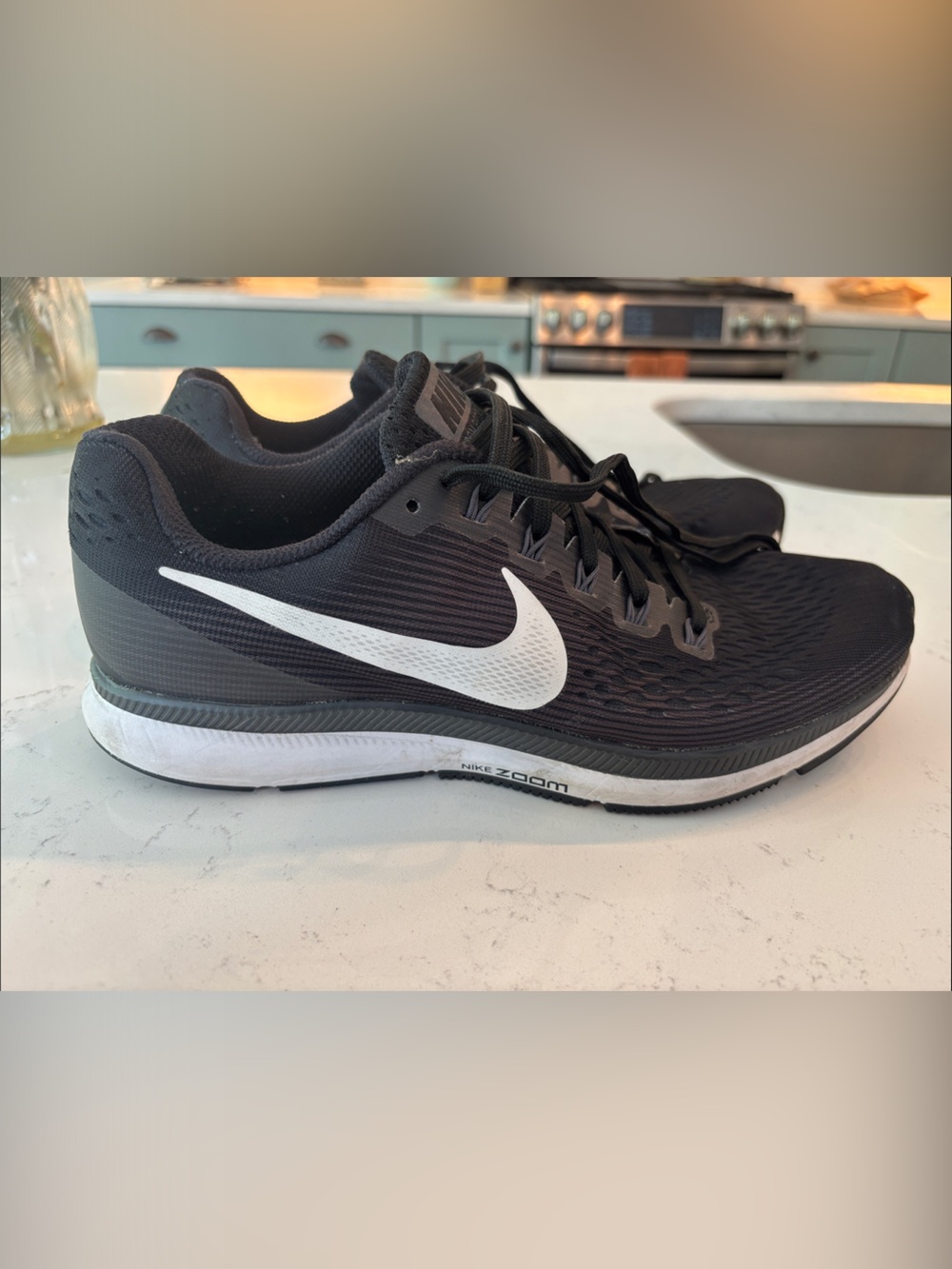 Nike Black Athletic Running Shoes with White Swoosh